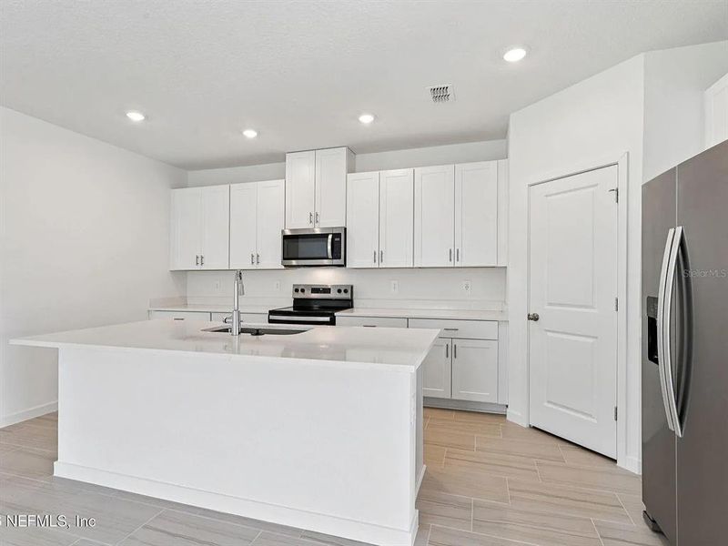 Furnished interior view inside a new home in Colbert Landings, Palm Coast (Image 10). Furnished interior view inside a new home in Colbert Landings, Palm Coast (Image 10).