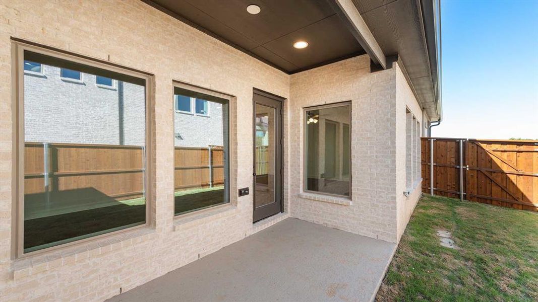 Exterior details and patio area of a home in The Heights At Uptown Celina 45', Celina (Image 17). Exterior details and patio area of a home in The Heights At Uptown Celina 45', Celina (Image 17).