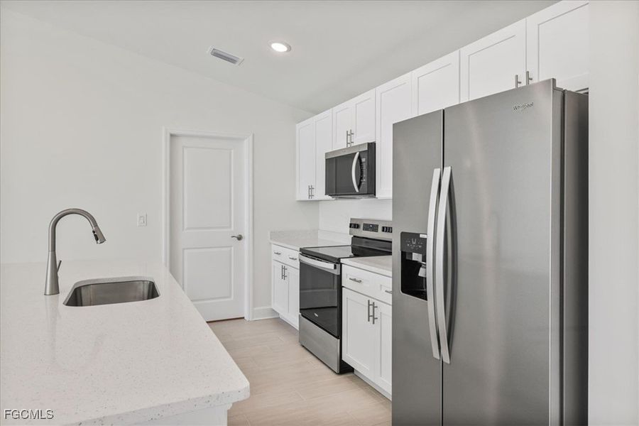 Furnished interior view inside a new home in Cape Coral, Cape Coral (Image 14). Furnished interior view inside a new home in Cape Coral, Cape Coral (Image 14).