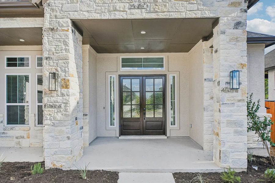 Representative exterior details of a home built from the Raegan by Chesmar Homes in Sweetwater, Austin (Image 3). Representative exterior details of a home built from the Raegan by Chesmar Homes in Sweetwater, Austin (Image 3).