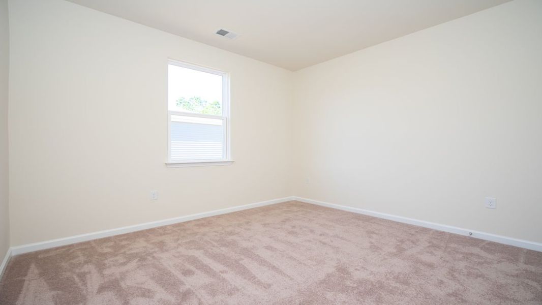 Representative unfurnished interior of a home built from the CALI by D.R. Horton in The Reserve at Wild Horse, Conway (Image 18).