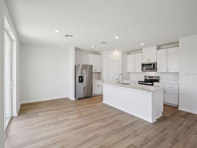 Furnished interior view inside a new home in Oakfield Trails - Premier Series, Parrish (Image 5).