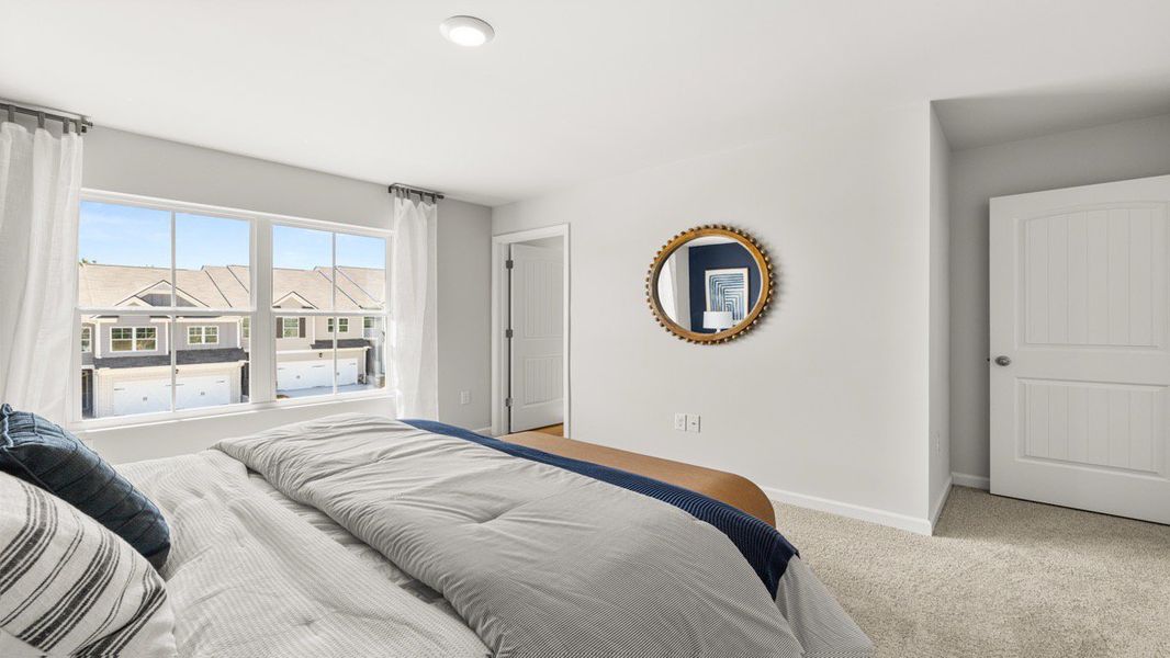 Representative furnished interior of a home built from the ADDINGTON by D.R. Horton in Waypoint, Flowery Branch (Image 18).