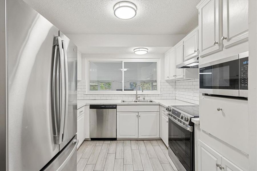 Furnished interior view inside a new home in , Whitney (Image 5).