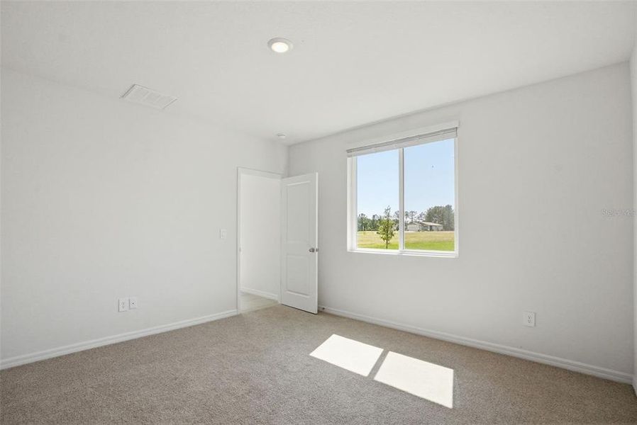 Spacious, unfurnished interior of a new home in Leyland Preserve - Premier Series, Brooksville (Image 30).