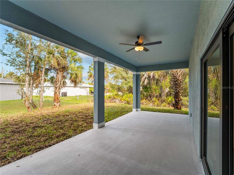 Exterior details and patio area of a home in , North Port (Image 40).