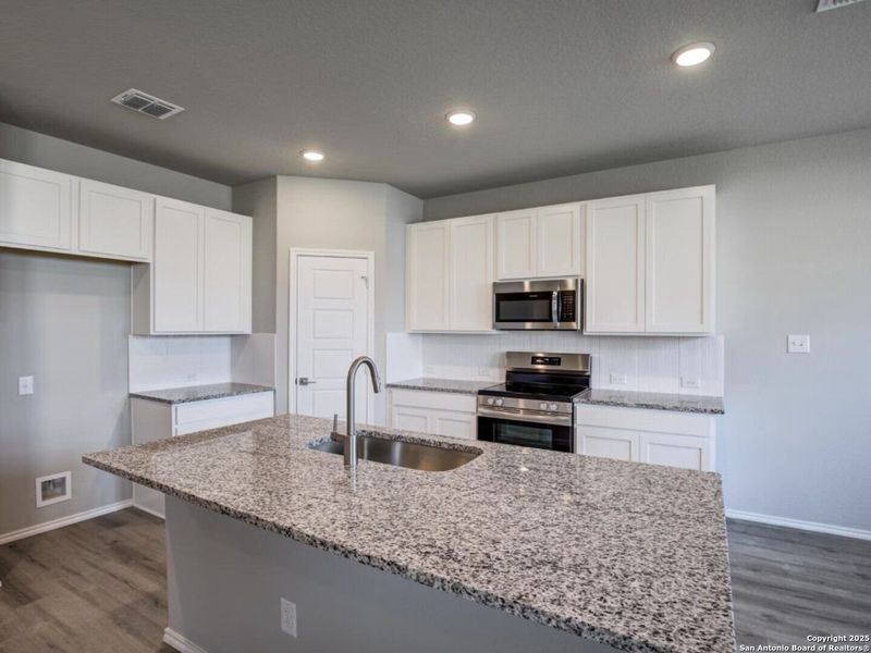 Furnished interior view inside a new home in Hickory Ridge, San Antonio (Image 26).