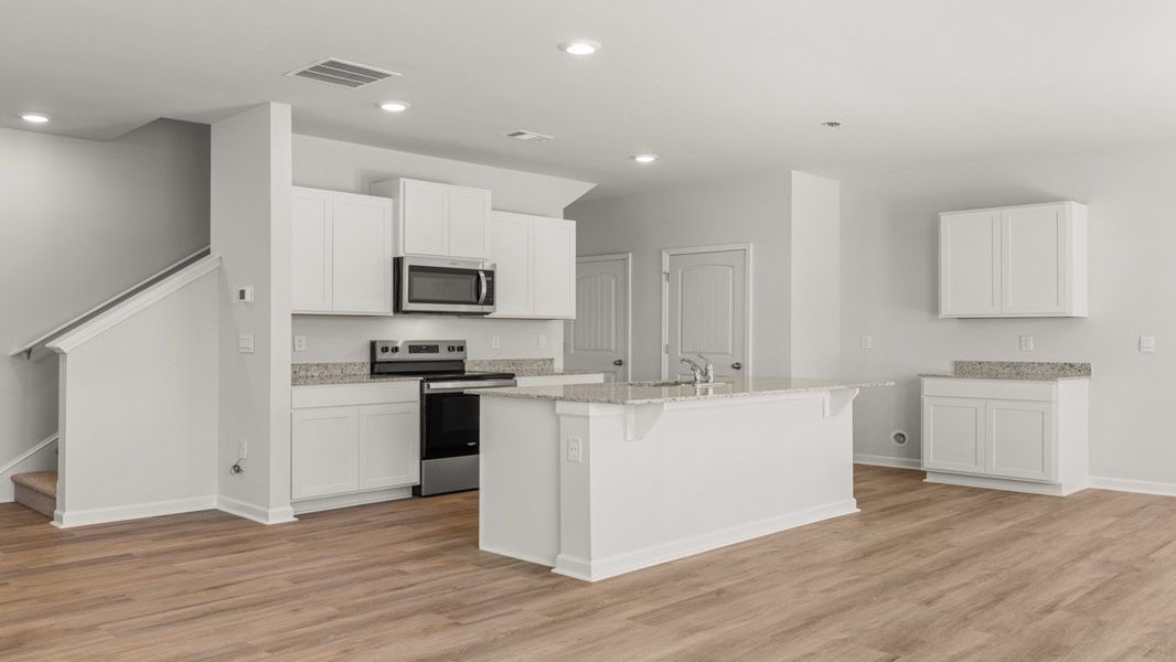 Representative furnished interior of a home built from the Aisle by D.R. Horton in Rolling Meadows, Jasper (Image 6).
