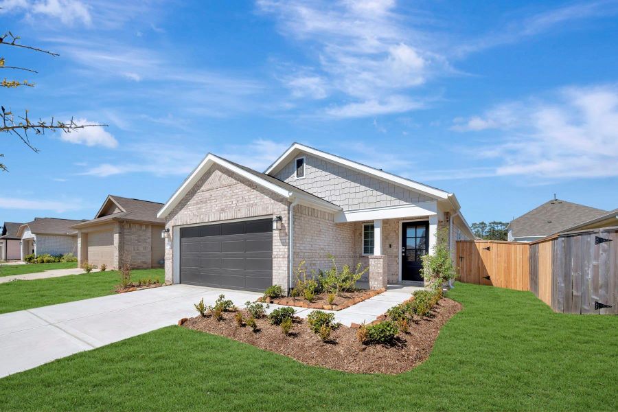 Front exterior of a new home in Magnolia Ridge, Magnolia, TX, highlighting curb appeal (Image 18).