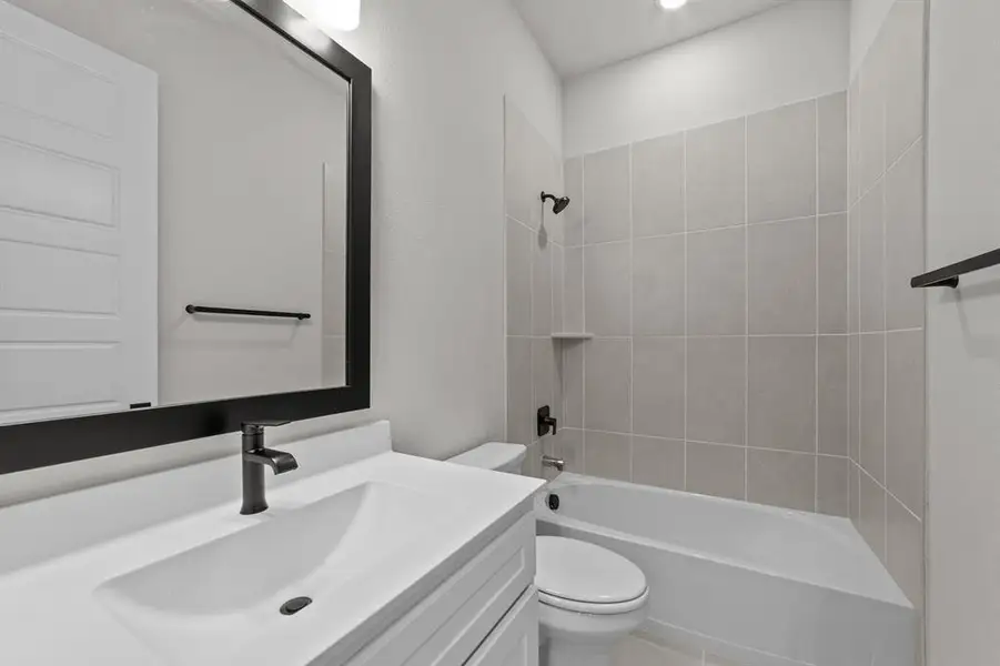 Furnished interior view inside a new home in South Pointe  Cottage Series, Mansfield (Image 14).