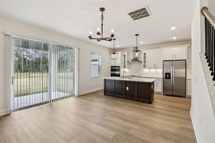 Furnished interior view inside a new home in Legends Preserve - Signature Series, Daytona Beach (Image 16).
