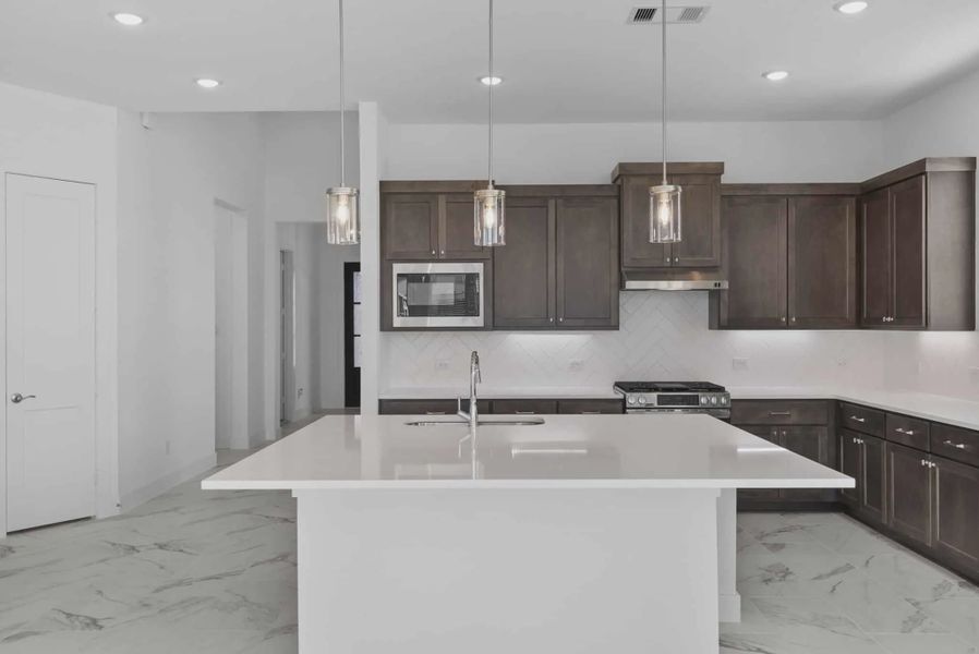 Representative furnished interior of a home built from the Nicklaus by Chesmar Homes in Riceland Alley Loads, Mont Belvieu (Image 19).