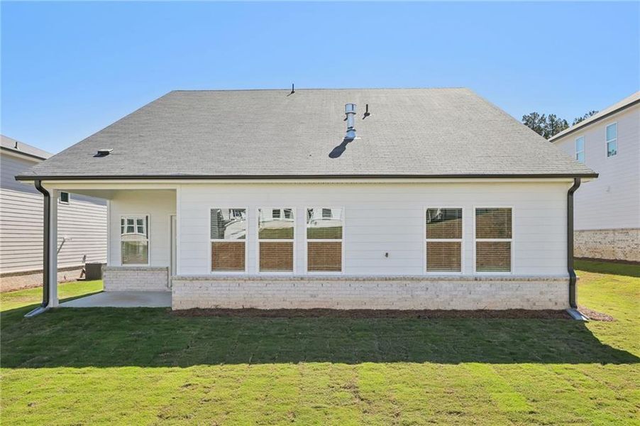 Exterior details and patio area of a home in Parkside at Grayson, Grayson (Image 2). Exterior details and patio area of a home in Parkside at Grayson, Grayson (Image 2).