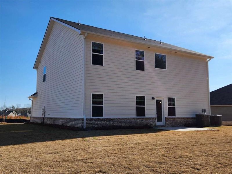 Exterior details and patio area of a home in Southern Hills, McDonough (Image 29).