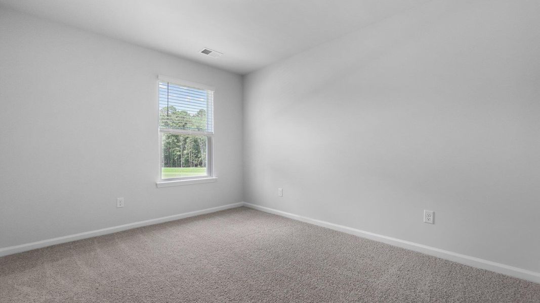 Spacious, unfurnished interior of a new home in Pine Hills at Cane Bay, Summerville (Image 12).