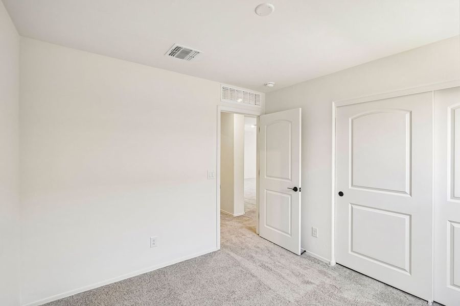 Spacious, unfurnished interior of a new home in Mandarina Reserve, Marana (Image 18). Spacious, unfurnished interior of a new home in Mandarina Reserve, Marana (Image 18).