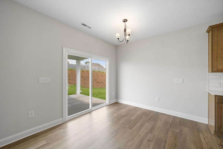 Spacious, unfurnished interior of a new home in Cottages at Piper Village, Trinity (Image 17).