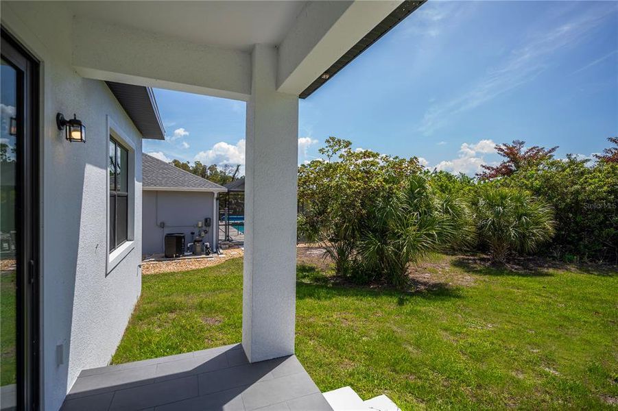 Exterior details and patio area of a home in , Port Charlotte (Image 33).