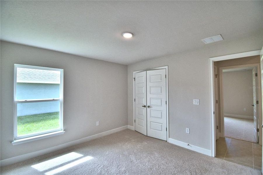 Spacious, unfurnished interior of a new home in Cadence Crossing, Auburndale (Image 49).