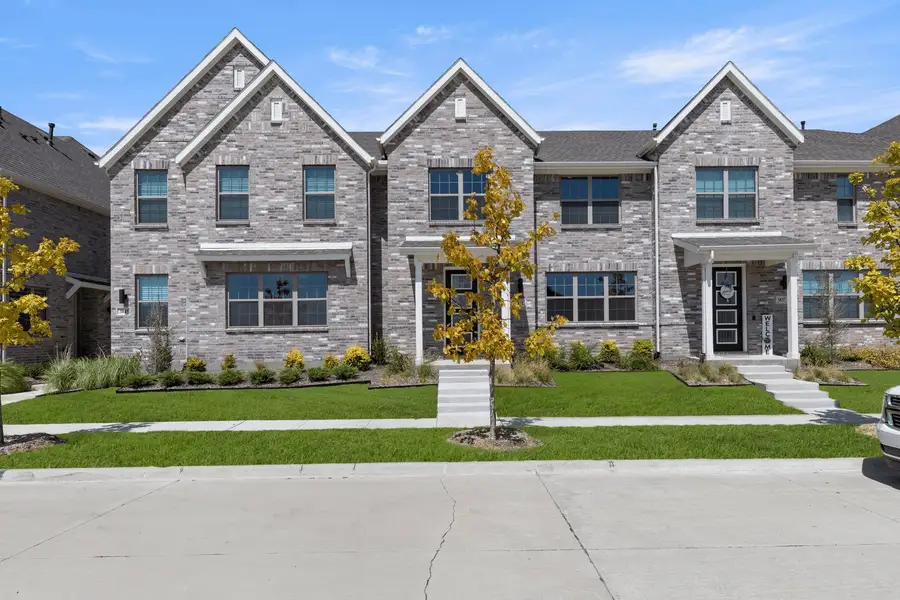 Front exterior of a new home in Mosaic, Prosper, TX, highlighting curb appeal (Image 1). Front exterior of a new home in Mosaic, Prosper, TX, highlighting curb appeal (Image 1).