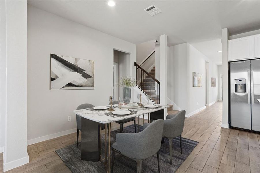 Step into your bright and spacious breakfast area, offering easy access to the kitchen and plenty of room for everyday dining, with extra space for entertaining.