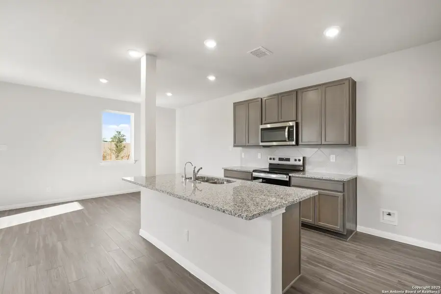 Furnished interior view inside a new home in Melissa Ranch, San Antonio (Image 10). Furnished interior view inside a new home in Melissa Ranch, San Antonio (Image 10).