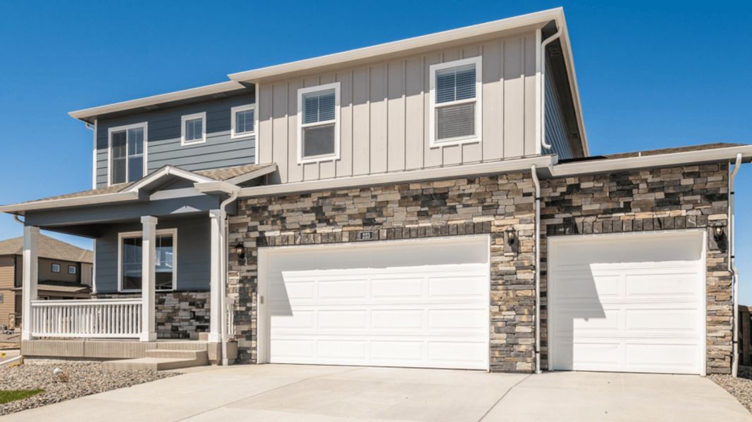 Front exterior of a new home in Vantage, Berthoud, CO, highlighting curb appeal (Image 1).