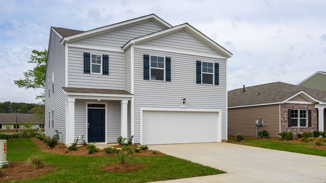 Representative exterior photo of a completed home built from the ROBIE by D.R. Horton in Island Green, Myrtle Beach, SC (Image 25).