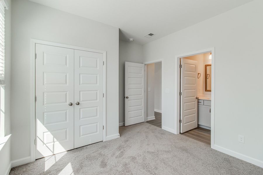 Spacious, unfurnished interior of a new home in Pebble Branch, Chapin (Image 24). Spacious, unfurnished interior of a new home in Pebble Branch, Chapin (Image 24).