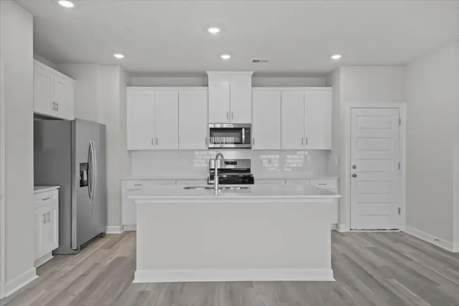 Furnished interior view inside a new home in Creek Ridge - Heritage Collection, Spartanburg (Image 4).