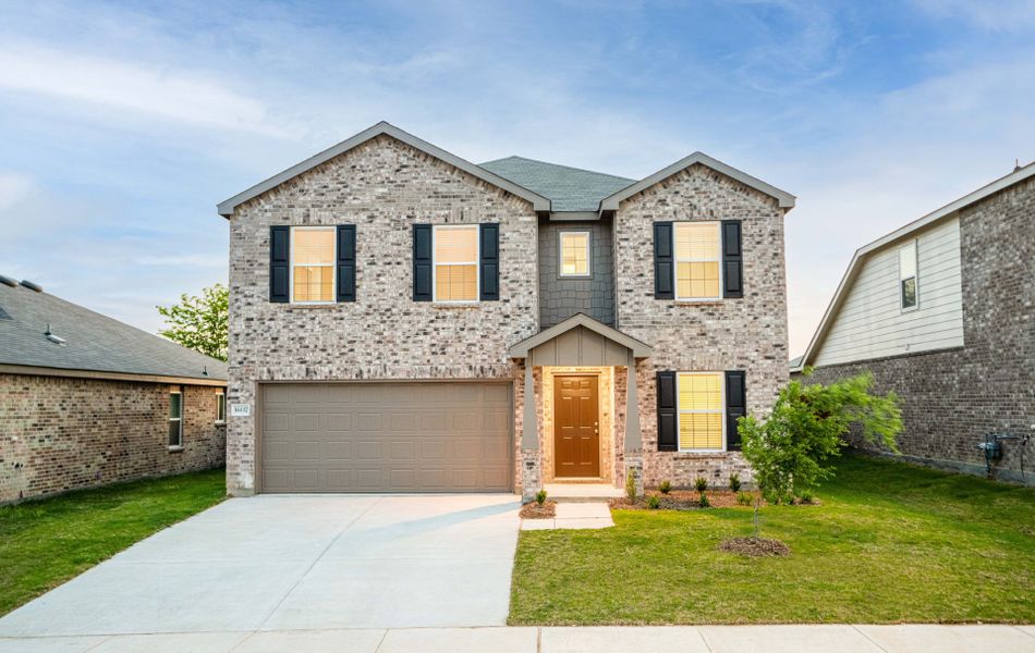 The Kisko, a two-story home with 2-car garage, shown with Home Exterior O