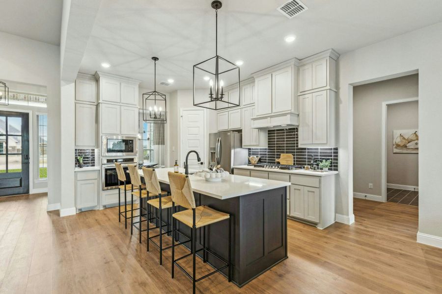 Representative furnished interior of a home built from the Reid by Kindred Homes in Oak Creek Ranch, Waxahachie (Image 13).