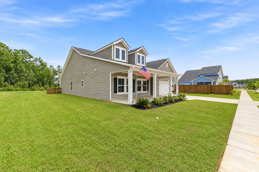 Front exterior of a new home in , Summerville, SC, highlighting curb appeal (Image 29).