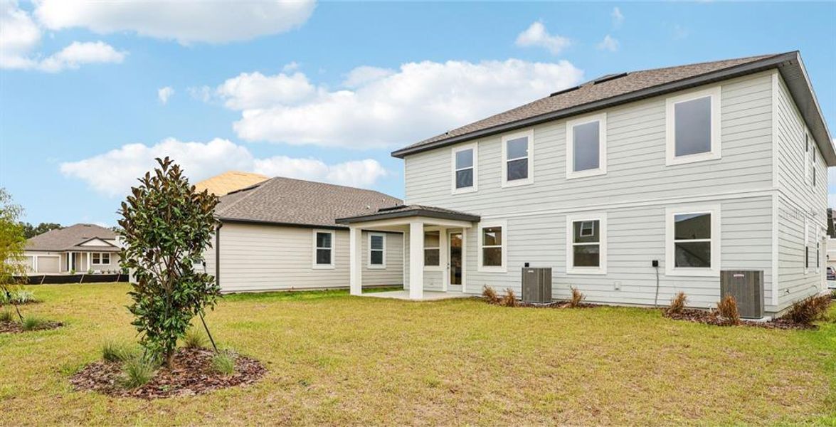Exterior details and patio area of a home in Trailside, Mount Dora (Image 15).