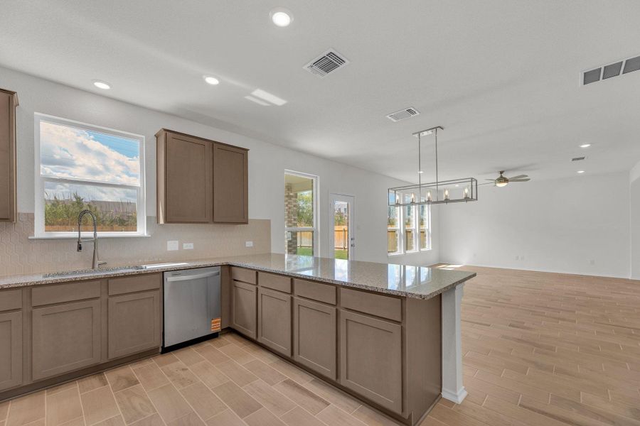 Furnished interior view inside a new home in Mustang Valley, Manor (Image 13).