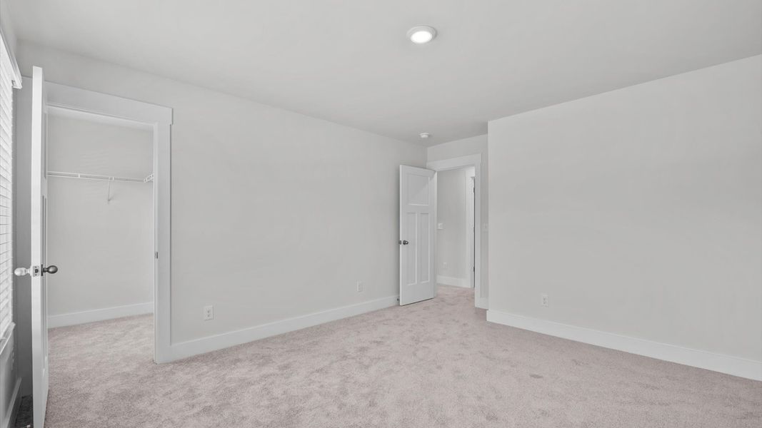 Representative furnished interior of a home built from the Jasmine by DRB Homes in Harrier Point, Woodruff (Image 17).