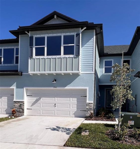 Front exterior of a new home in , Seminole, FL, highlighting curb appeal (Image 1). Front exterior of a new home in , Seminole, FL, highlighting curb appeal (Image 1).