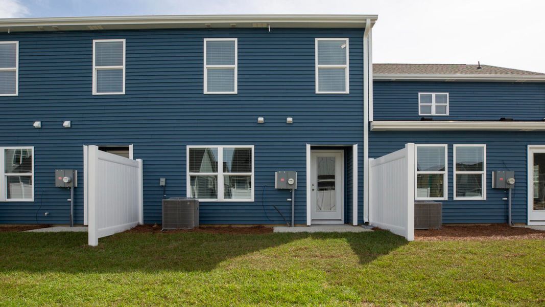 Representative exterior photo of a completed home built from the Pearson by D.R. Horton in Waterside Townhomes, Surf City, NC (Image 2).