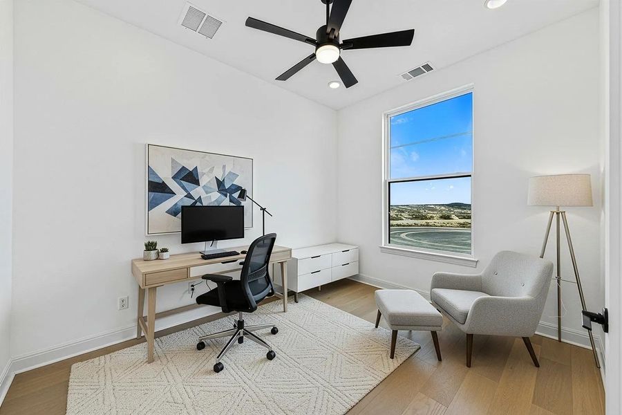 Furnished interior view inside a new home in Lariat - 70', Liberty Hill (Image 4).