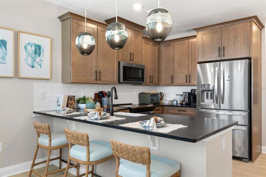 Furnished interior view inside a new home in Gatherings® of Lake Nona, Orlando (Image 25).