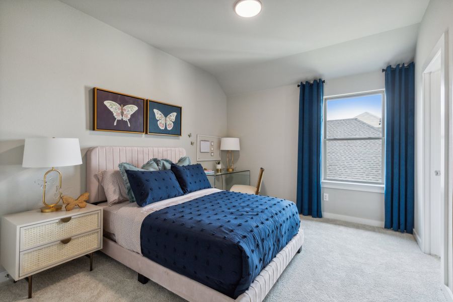 Bedroom in the Willow home plan by Trophy Signature Homes – REPRESENTATIVE PHOTO