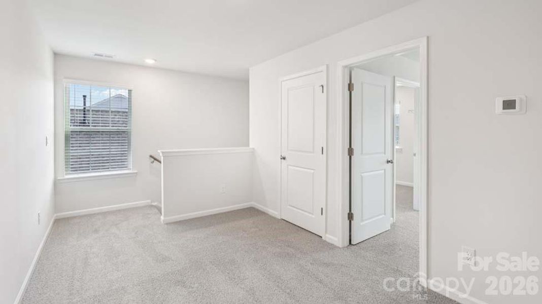 Spacious, unfurnished interior of a new home in Wallace Springs, Statesville (Image 27).