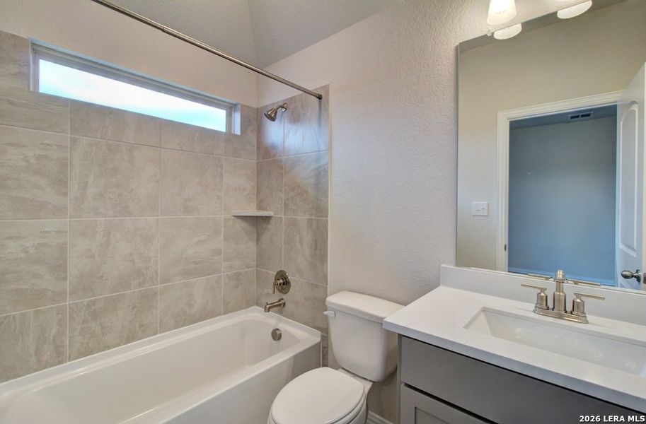 Furnished interior view inside a new home in Stream Waters, Seguin (Image 8).