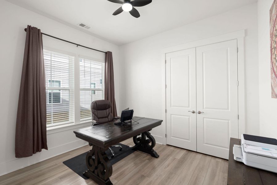 Furnished interior view inside a new home in Summerwind Crossing at Lakes of Cane Bay, Summerville (Image 18).