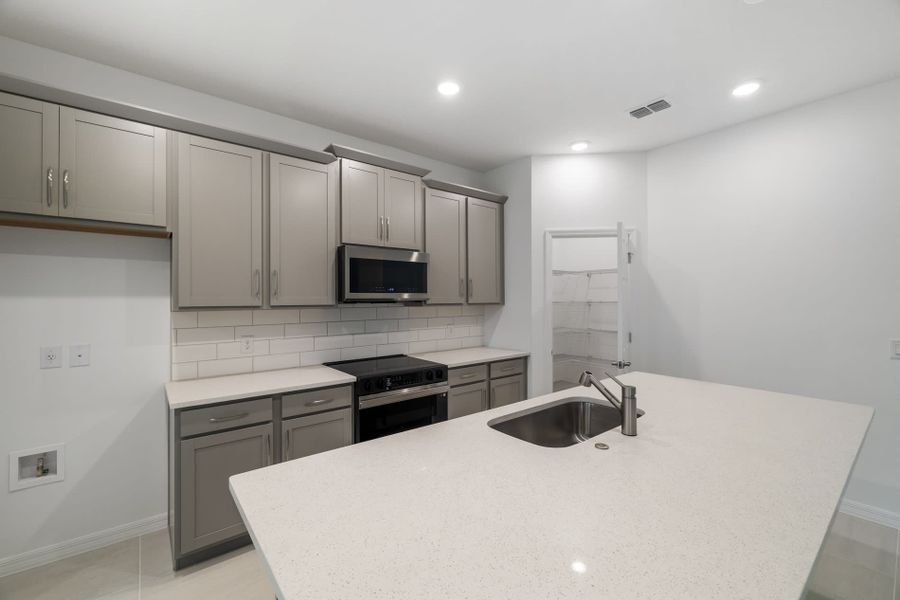 Furnished interior view inside a new home in Trinity Gardens, Deland (Image 4).