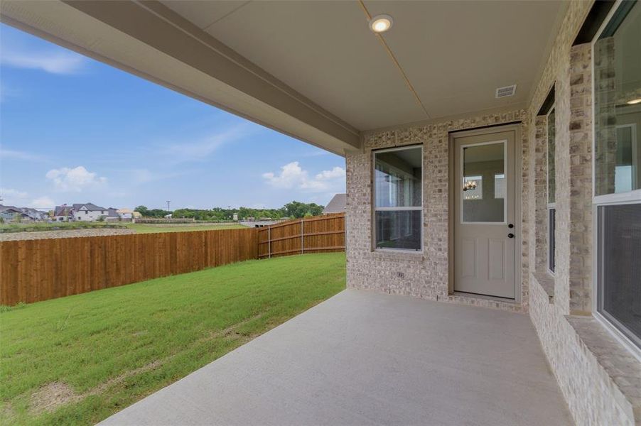 Exterior details and patio area of a home in Cedar Ridge Estates, Anna (Image 22).