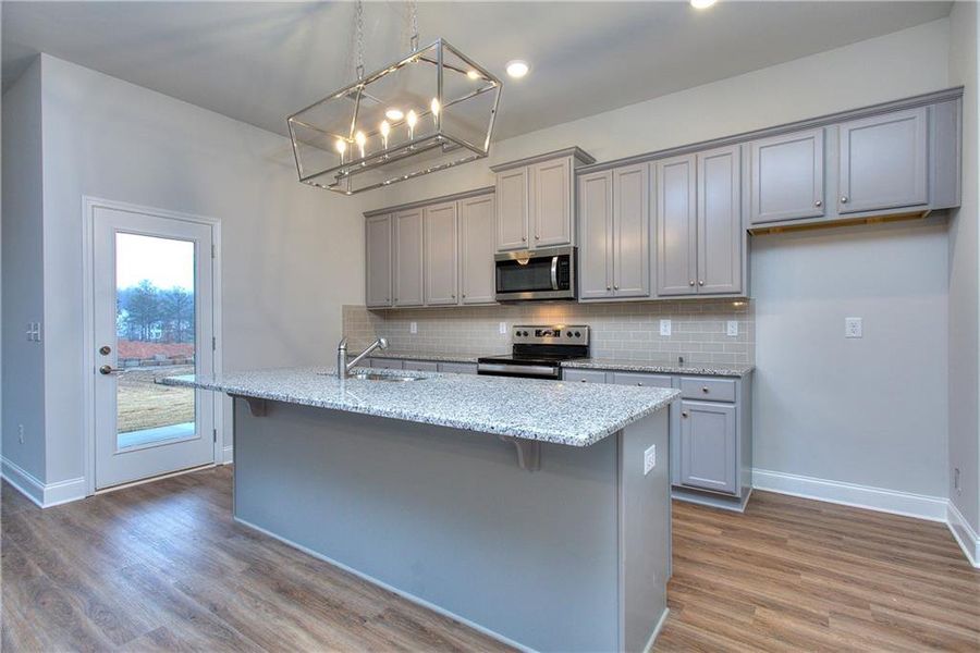 Furnished interior view inside a new home in , Homer (Image 8). Furnished interior view inside a new home in , Homer (Image 8).