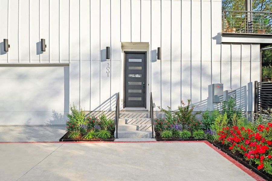 Doorway to property with board and batten siding