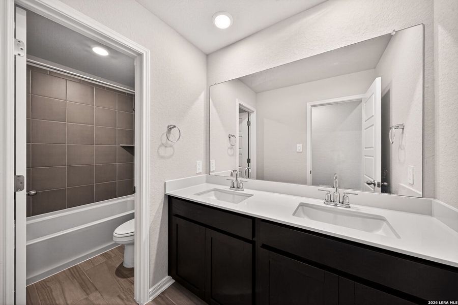 Furnished interior view inside a new home in Thomas Pond, San Antonio (Image 11).