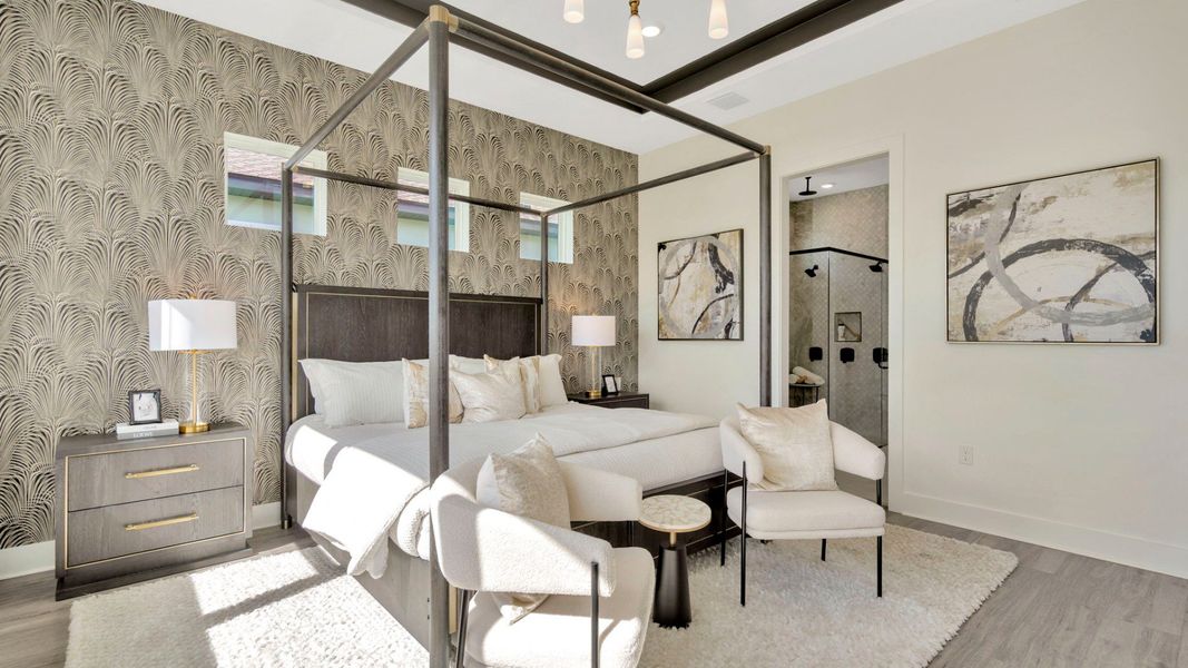 The Primary Bathroom of a DRB Homes Grand Eider model, which is a home plan offered at Serengeti in Spring Hill, FL.